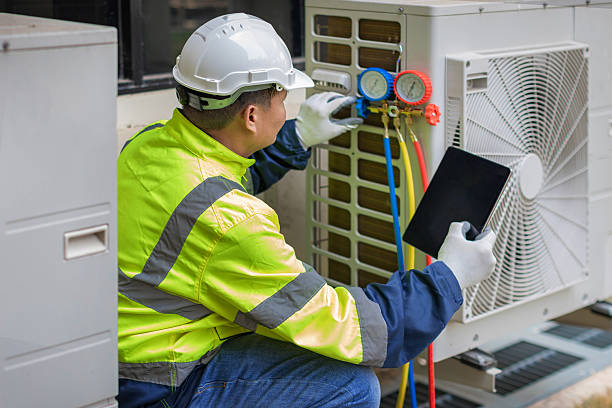 Professional Air Duct Cleaning technician working in Elloree, SC
